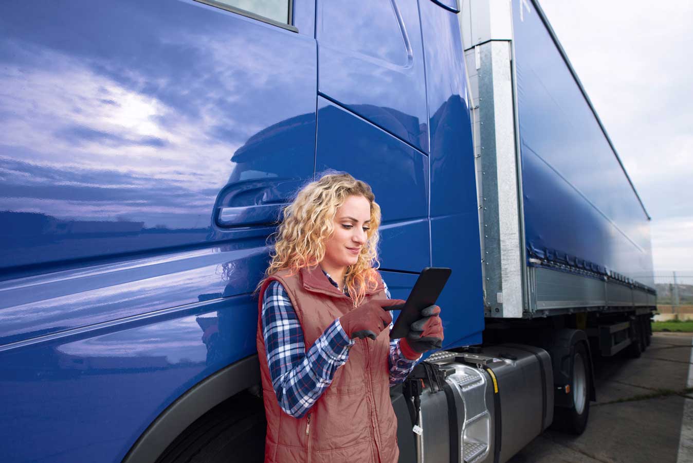 girl next to truck